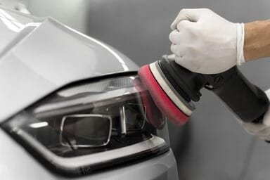 Machine polishing a vehicle’s paint