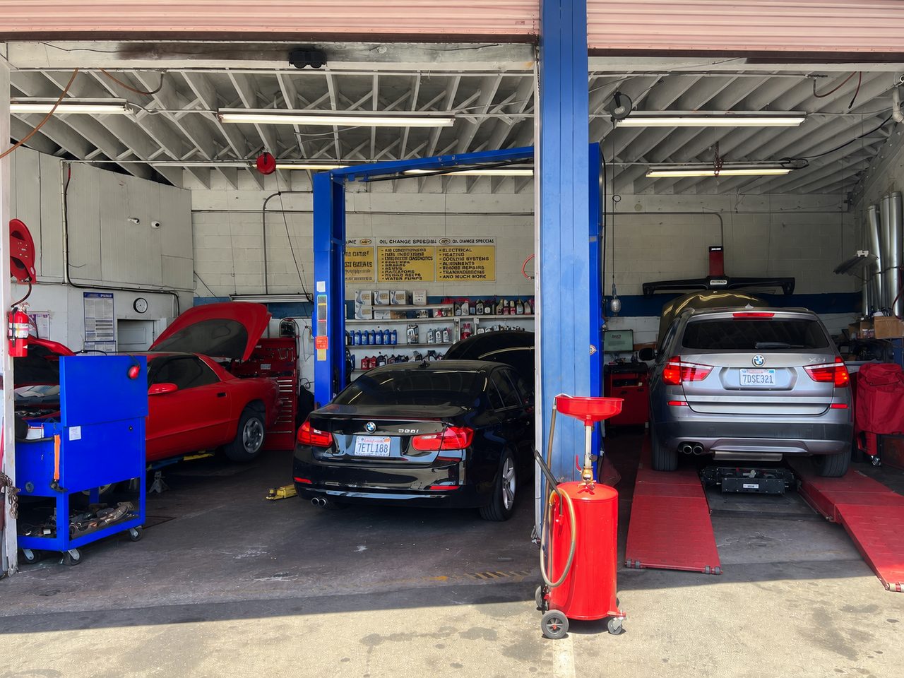 King Harbor service bays — AI-assisted adaptation of an owner-published shop photo